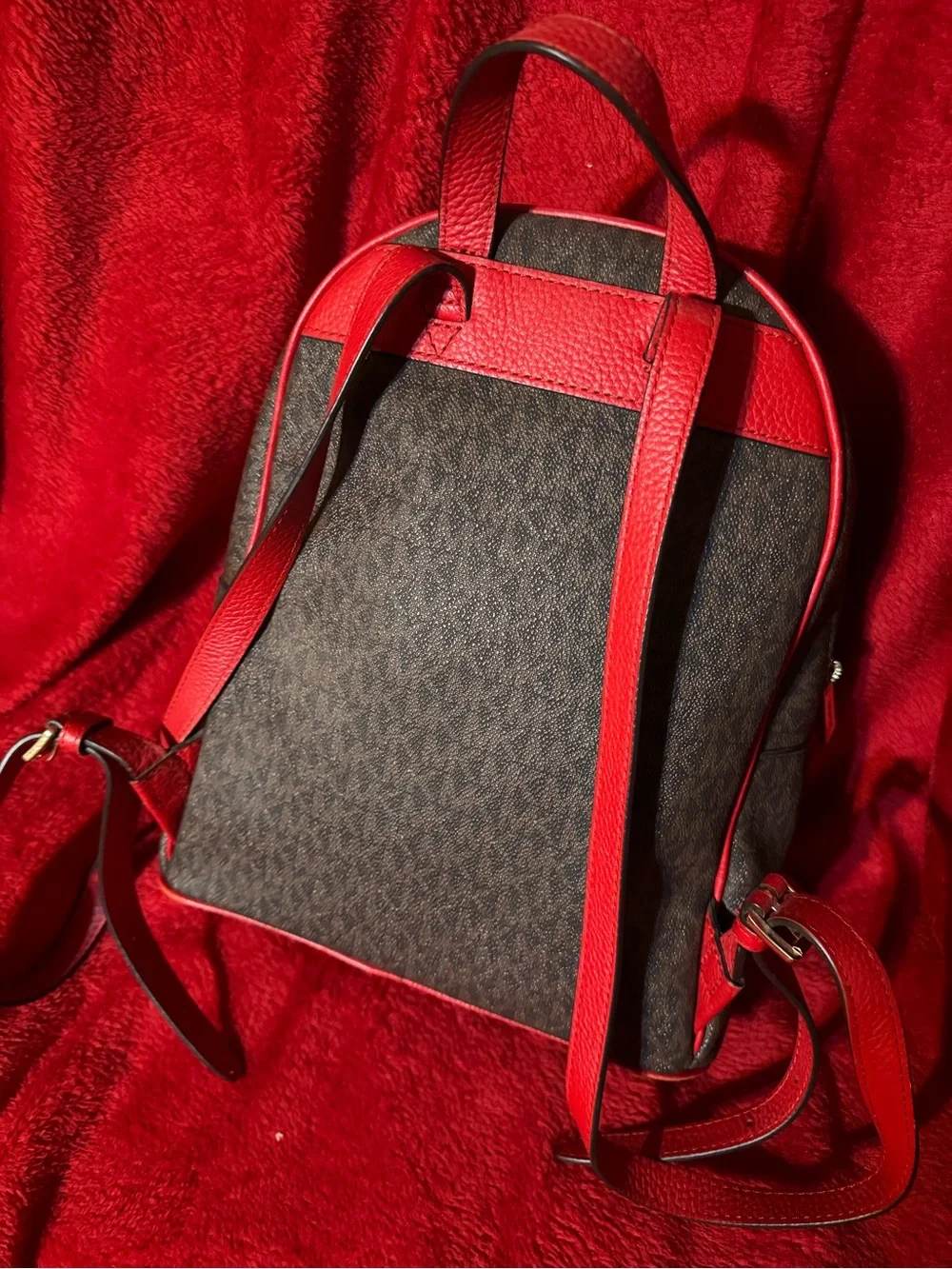 Michael Kors Brown Monogram Backpack with Red Trim and Gold Logo